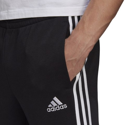 Spodnie męskie adidas Essentials Tapered Cuff 3 Stripes czarne GK8831