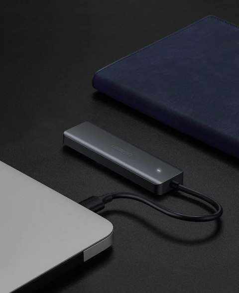 Ugreen rozdzielacz HUB USB Typ C - 4x USB 3.2 Gen 1 z portem zasilania USB Typ C szary (CM219 70336)